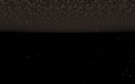 A screenshot was taken below the Nether's final bedrock layer (Image via Minecraft)